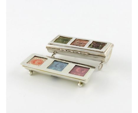 An Edwardian silver triple stamp box, by the Deakin and Francis, Birmingham 1901, trough form, hinged cover with three glazed