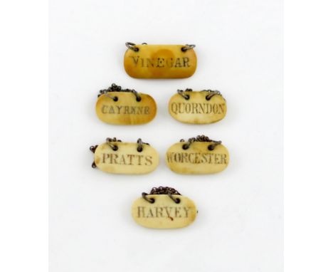 λA collection of six ivory sauce labels, rounded rectangular form, incised and blackened 'QUORNDON', 'PRATTS', 'HARVEY', 'CAY