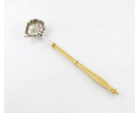 λA George III silver punch ladle, by Hester Bateman, London 1783, oval lobed form, turned ivory baluster handle, length 36cm.