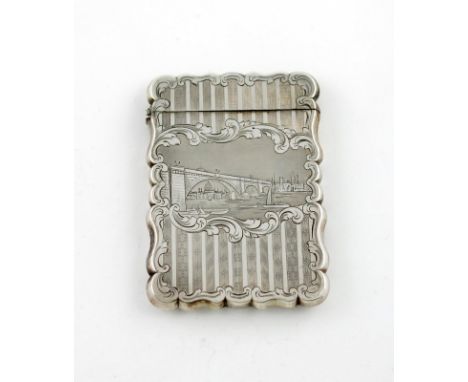 A Victorian silver engraved 'castle-top' card case, London Bridge, by Nathaniel Mills, Birmingham 1848, rectangular form, the