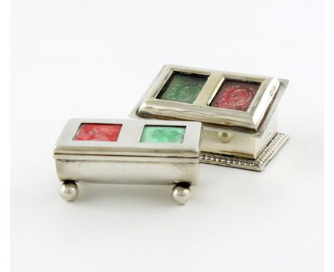 A late-Victorian silver double stamp box, maker's mark worn, Chester 1900, rectangular sloping form, with two panels, on a ga