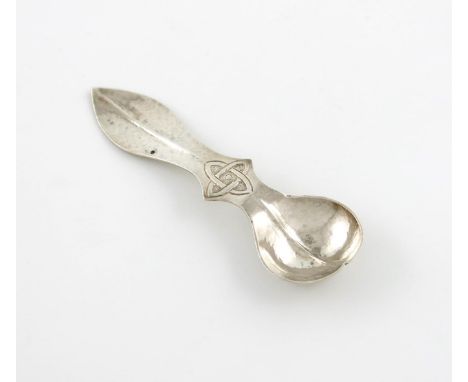 An Irish Arts and Crafts silver caddy spoon, by D. Moulan, Dublin 1924, shaped circular bowl, spot hammered decoration, taper