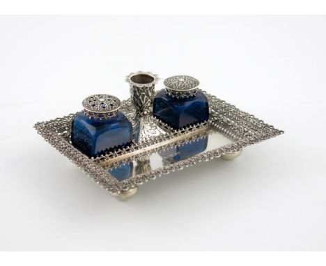 An early-Victorian silver inkstand, by Gervase Wheeler, Birmingham 1841, rectangular form, pierced border, with a central tap