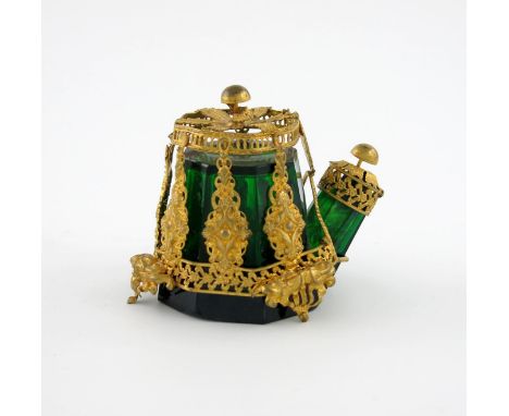 An early Victorian gilt metal mounted green glass inkwell, possibly by G. Riddle, tapering eight sided form, the spout with a