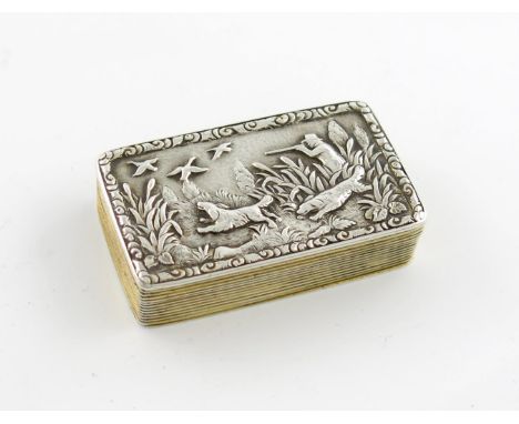 A Victorian silver-gilt snuff box, by Joseph Willmore, Birmingham 1844, rectangular form, the hinged cover with a raised reli