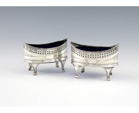 A pair of George III silver salt cellars, by Crispin Fuller, London 1796, oval form, pierced and engraved decoration, on four