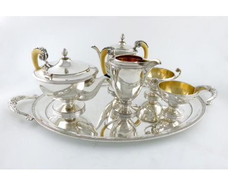 λA six-piece Austro-Hungarian silver tea and coffee set, Vienna, circa 1910-20, comprising: a two-handled tray, a teapot, a c