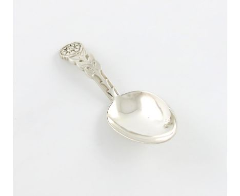 By R.E. Stone, a silver caddy spoon, London 1953, oval bowl, the tapering handle with a stylised rose, length 9.7cm, approx. 