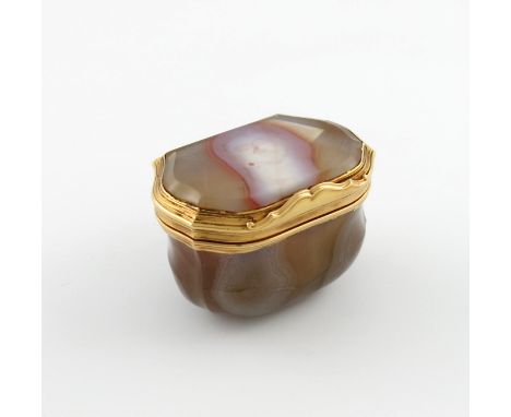 An 18th century gold-mounted agate snuff box, unmarked, probably English or German, cartouche form, reeded mounts and scroll 
