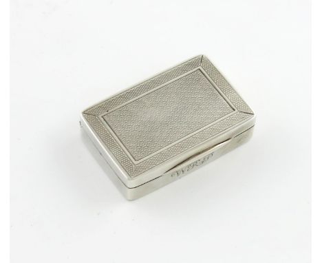 A silver snuff box, by George Unite, Birmingham 1924, rectangular form, engine-turned decoration, plain thumb-piece, gilded i
