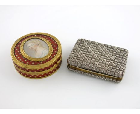 λA late 18th century gilt-metal mounted portrait snuff box, circular form, engraved borders, the pull-off cover with an oval 