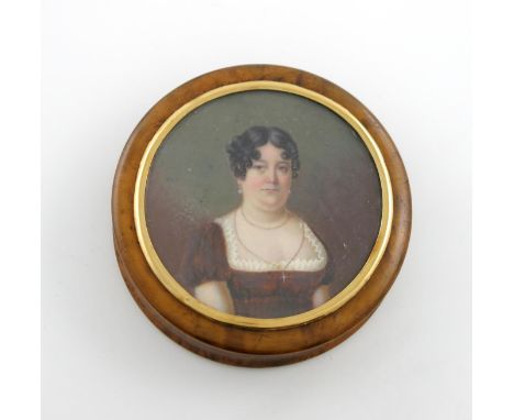 λA 19th century burr birch portrait snuff box, circular form, the pull-off cover with a miniature under glass of a seated lad