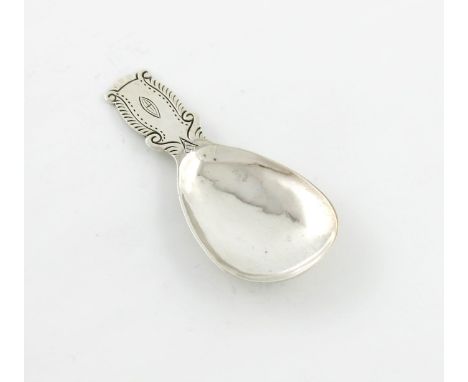 By Liberty and Co, a silver caddy spoon, Birmingham 1930, also stamped 3181, plain pear shaped bowl, the handle also with eng