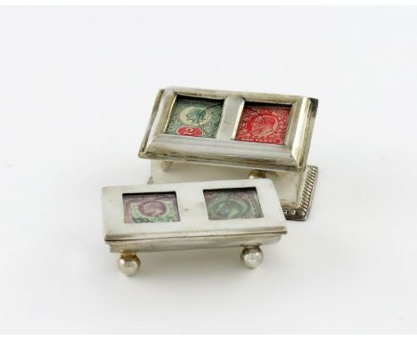 An Edwardian silver double stamp box, maker's mark JJ, Birmingham 1906, rectangular sloping form, with two panels, on a gadro