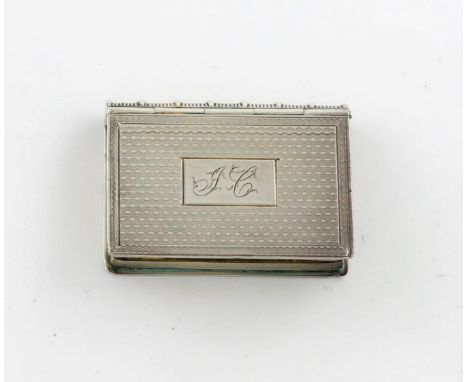 A Victorian silver vinaigrette, by Edward Smith, Birmingham 1857, rectangular book form, engine-turned decoration, the cover 