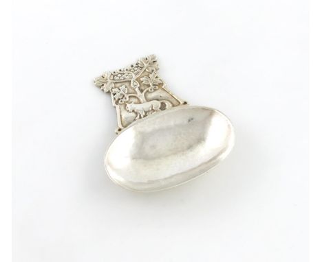 By A.E. Jones, an Arts and Crafts caddy spoon, Birmingham 1916, sideways oval bowl, the handle cast with a fox and grapevines