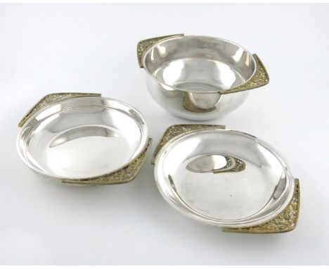 By Stuart Devlin, a suite of three modern graduated silver and silver-gilt dishes, London 1978, circular form, pierced silver