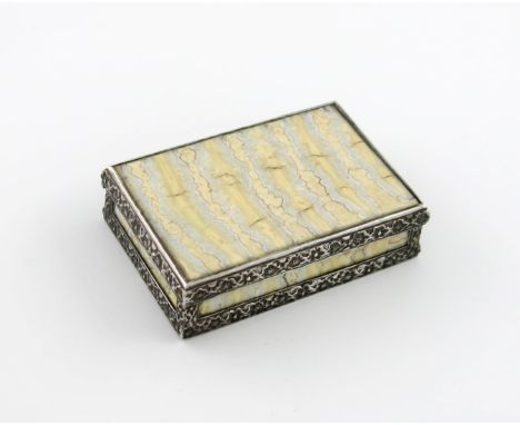 λA 19th century silver-mounted mammoth tooth snuff box,  unmarked,  the mounts with foliate decoration, the cover sides and b