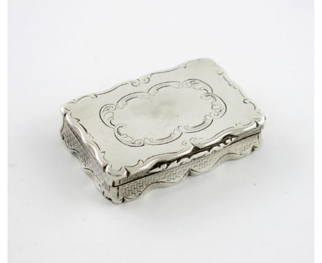 A Victorian silver snuff box, by Frederick Marson, Birmingham 1852, rectangular form, engine-turned sides, the cover with eng