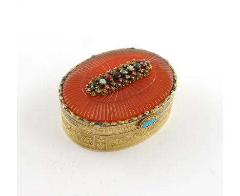 An early 19th century jewel-set, hard stone and gold box unmarked, oval form, the cover set with a reeded panel of amber-colo