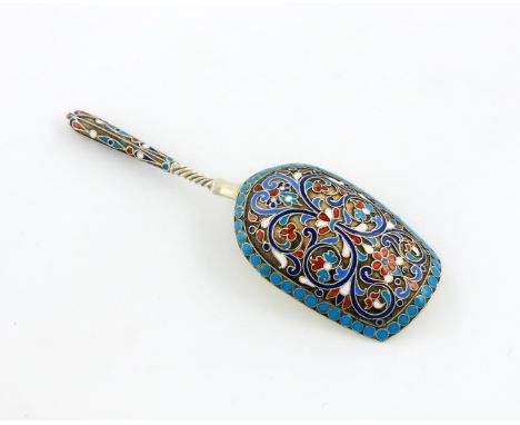 A late-19th century Russian silver-gilt and enamel caddy spoon, assay master Anatoly Artsybashev, Moscow circa 1880-90, maker