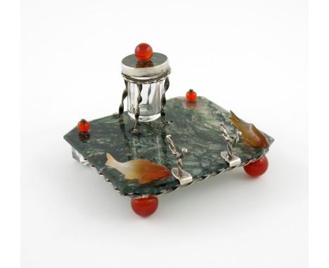 A moss agate inkstand, rectangular form, mounted with a metalware inkwell, with a hinged moss agate cover with a ball finial,