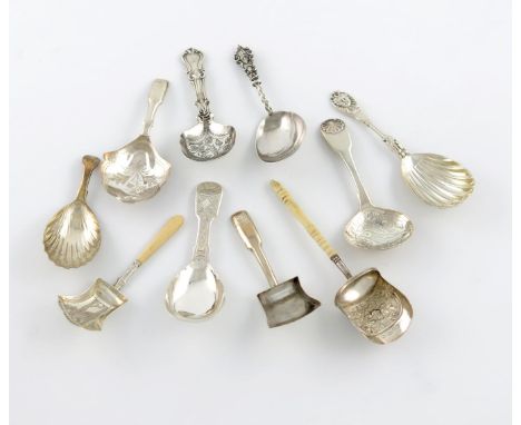 λA collection of ten silver caddy spoons, comprising: one with a foliate shovel bowl, and turned bone handle, by Joseph Willm
