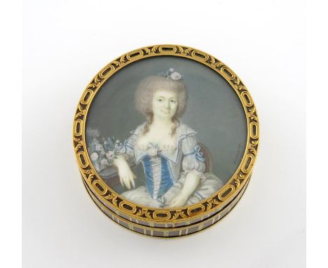 λAn 18th century gold-mounted blonde tortoiseshell portrait snuff box, circular form, the cover set with a miniature under gl