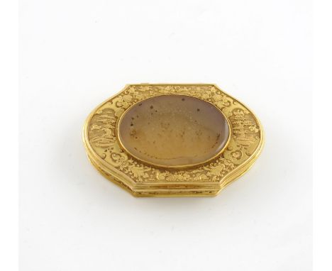 An 18th century gold-mounted moss agate snuff box, unmarked, probably English, circa 1740, shaped oblong form, the hinged cov