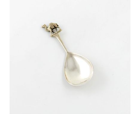 The Worshipful Company of Grocers, a silver caddy spoon, by J. Mappin, London 1894, fig-shaped bowl, the handle with a camel 