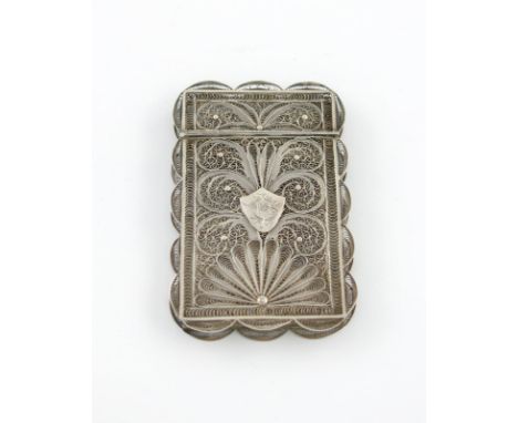 A 19th century silver filigree card case, unmarked, possibly Chinese, rectangular form, hinged cover, wavy-edge border, folia