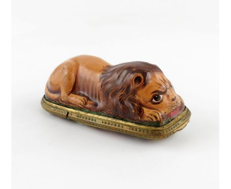 A Birmingham or South Staffordshire enamel gilt-metal mounted snuff box or bonbonniθre, c.1760, modelled as a recumbent lion,