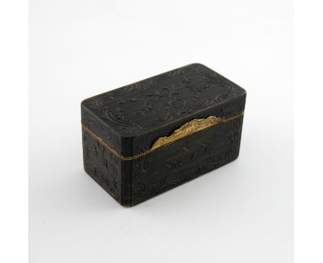 λA late 18th century gilt-metal mounted pressed tortoiseshell snuff box, probably French, upright rectangular form, with foli