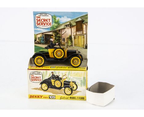 A Dinky Toys 109 Gabriel Model T Ford, from Gerry Anderson's The Secret Service, yellow/black body, Father Unwin figure, in o