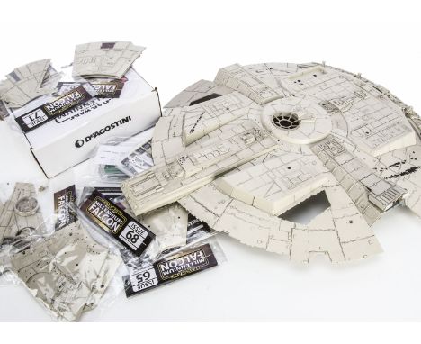 DeAgostini Build The Millennium Falcon Kit Parts, forty one unopened parts, with partially made base and a quantity of loose 
