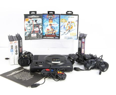 Sega Mega Drive Console &amp; Games, Sega Mega Drive with cables, four controllers (three official), manual and eight boxed g