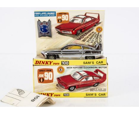 A Dinky Toys 108 Sam's Car From Joe 90, chrome body, dark yellow interior, red engine cover, in original box with 'WIN' badge