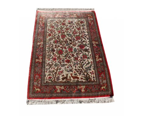 Persian Silk "Tree of Life" Rug, signed. Beautiful silk rug with ivory interior with red boarder. Intricately woven with bird