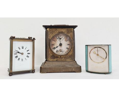 19th century brass four glass carriage clock with enamel dial and Roman numerals, another smaller clock and a metal carriage-