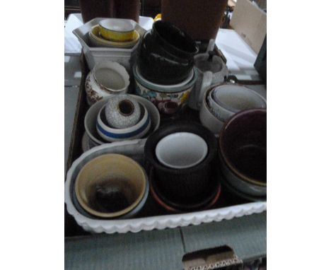 Large quantity of ceramic plant holders, a quantity of glass including Art Deco pink candlesticks, pressed glass, storage jar