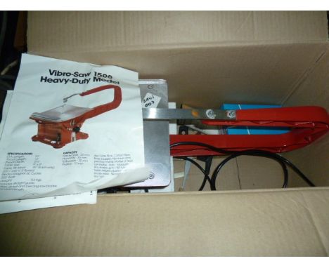 Black & Decker electric hedge trimmer, a boxed table jigsaw, two saw horses, a carpenter's toolbox and an electric glue pot 