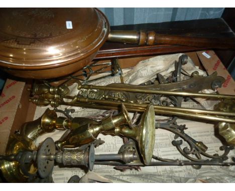 Various metalware including a brass trivet, fire irons, a copper warming pan, a pair of brass candlesticks, a wrought iron ce