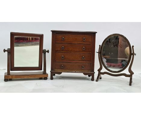 19th century miniature mahogany chest of four drawers, with fluted pilasters, bracket feet and two dressing table swing mirro