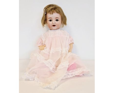 Simon & Halbig Kammer & Reinhardt bisque headed doll inscribed 'K*R Simon & Halbig 126 46' with brown fixed eyes, open mouth 