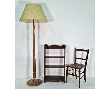 Oak open bookcase, a cane-seated chair and a standard lamp (3) 