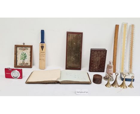 19th century brass cribbage board, an autograph book, a miniature cricket bat, various rulers, a brass inlaid box, and a coll