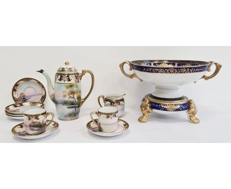 Noritake porcelain two-handled footed bowl, painted to interior with mountainous lakeside decoration with three-legged stand 