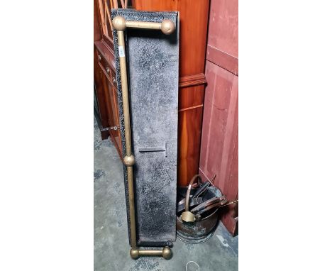 Brass and iron fire curb and a small selection of fireside tools 