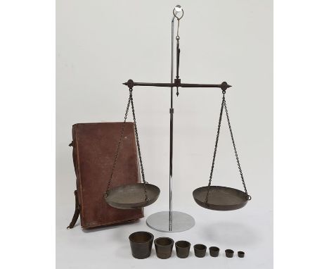 Set of scales and brass weights in leather suitcase