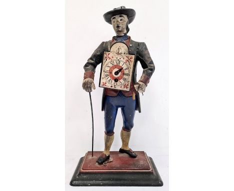 A painted metal travelling figure with painted clock to his front, Roman numeral dial with painted surround, floral and boat 